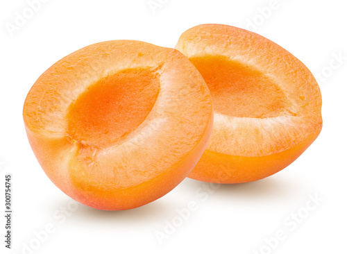 two halves of apricot isolated on a white background