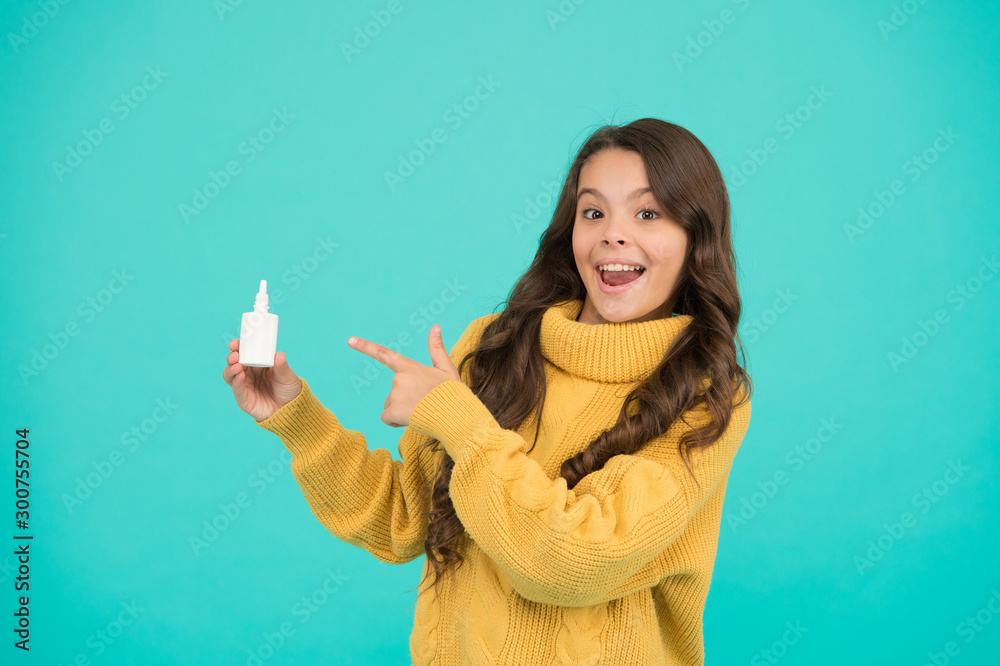 Kid use effective medicines. Girl hold nasal drops. Allergy concept