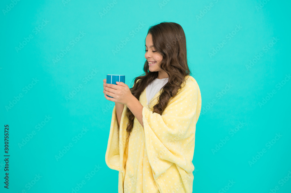 Evening routine. Health Benefits of Drinking Milk Before Bed. Little child hold mug. Girl in pajamas drinking tea. Relaxation before sleep. Drinking milk just before heading to bed. Bedtime Beverages Evening routine. Health Benefits of Drinking Milk Before Bed. Little child hold mug. Girl in pajamas drinking tea. Relaxation before sleep. Drinking milk just before heading to bed. Bedtime Beverages
