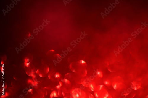 Abstract red bokeh background. Defocused background.