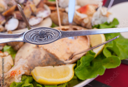 Brown crab fork and portuguese seafood meal of marisqueira photo