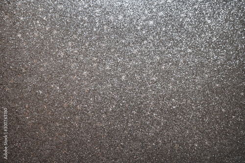 Silver and gray glitter with bokeh background. Glitter and Christmas abstract background.