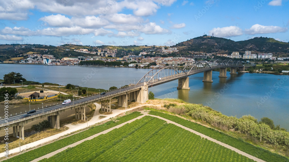 Aerial view of Vila Franca Xira, Lisbon, Portugal. Bridge Marechal Carmona on river Tagus. Drone photo.