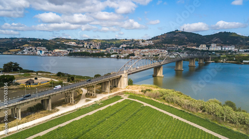 Aerial view of Vila Franca Xira, Lisbon, Portugal. Bridge Marechal Carmona on river Tagus. Drone photo.