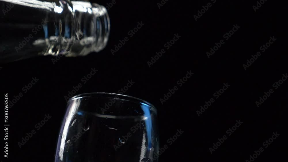 vodka is poured into a stack vodka is poured into a stack