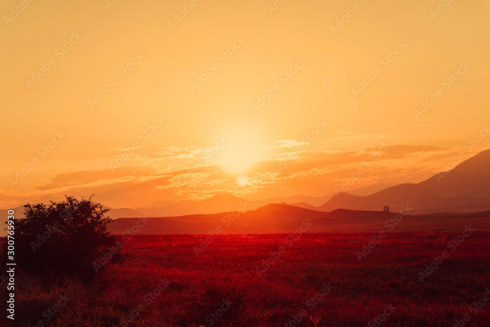 Red golden sunset in the flat terrain