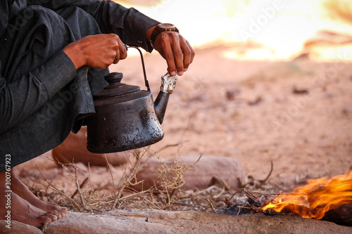 Bedouin tea preparation in the desert of Wadi Rum Jordan