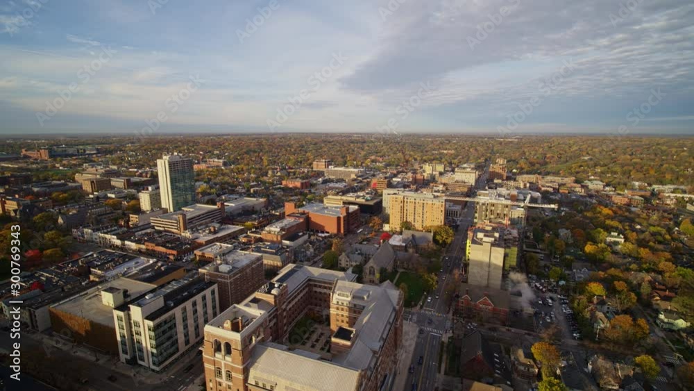 Ann Arbor Michigan Aerial v28 Traveling wide panoramic downtown cityscape view at sunrise - October 2017 Ann Arbor Michigan Aerial v28 Traveling wide panoramic downtown cityscape view at sunrise - October 2017