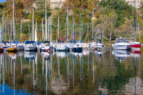reflection of boats in marina