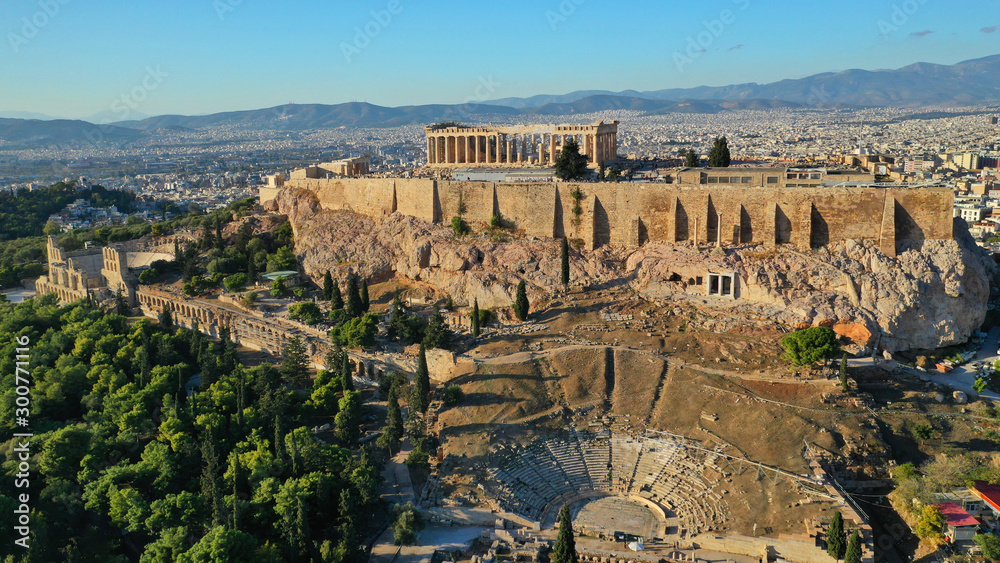 Aerial birds eye view photo taken by drone of iconic Acropolis hill and the masterpiece of ancient world the Parthenon and Dionysus theatre, Athens historic centre, Attica, Greece