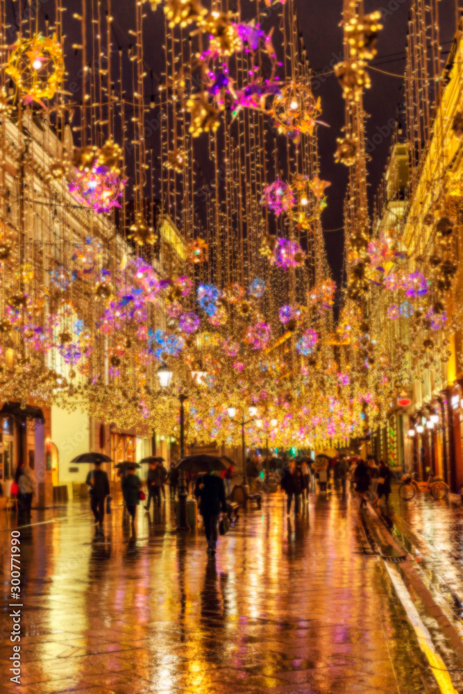 New Year's street illumination. Blurred. Background. Space for text.