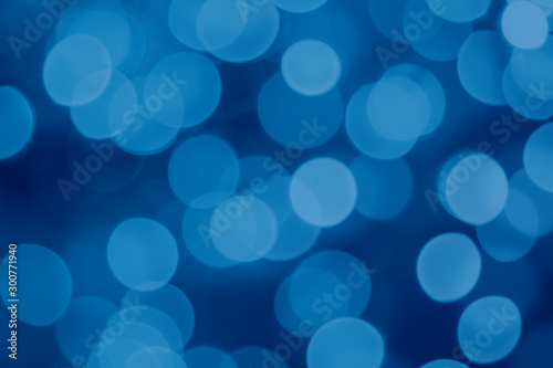 Unfocused abstract blue background. Mock-up of a festive background in the form of a bokeh for your magnificent design.