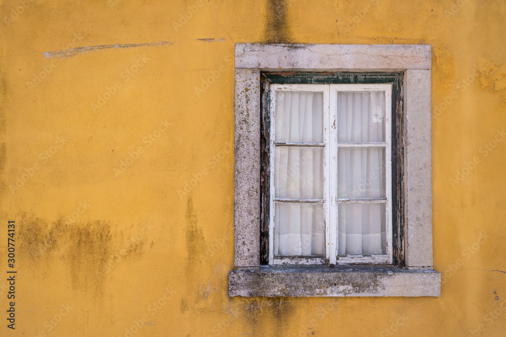  white window ce old wood with yellow wall