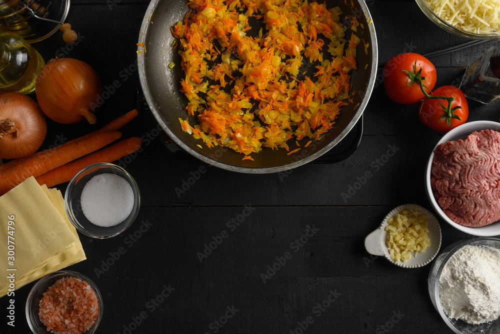 cooking Italian lasagna, preparing dressing for lasagna, Italian