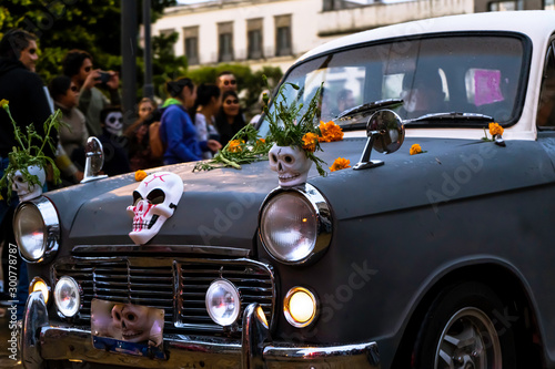 El coche fúnebre desfila por las calles del centro histórico de Guadalajara el día de los muertos. photo