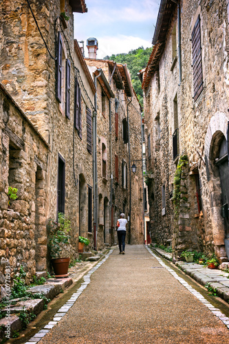 Narrow cozy streets of medieval picturesque town of Villefranche-de-Conflent, Occitanie, in the Pyrénées-Orientales department in southern France