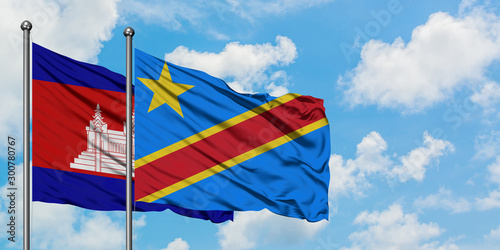 Cambodia and Congo flag waving in the wind against white cloudy blue sky together. Diplomacy concept, international relations.