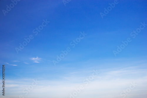 Fantastic soft white clouds against blue sky and copy space.