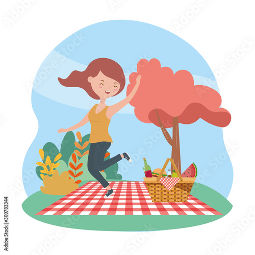 happy woman basket blanket picnic nature