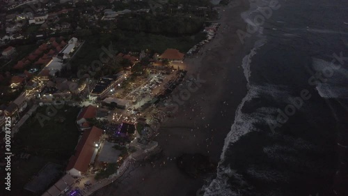 Night Surfing in Batu Balong beach Bali Island 4K Drone flight photo