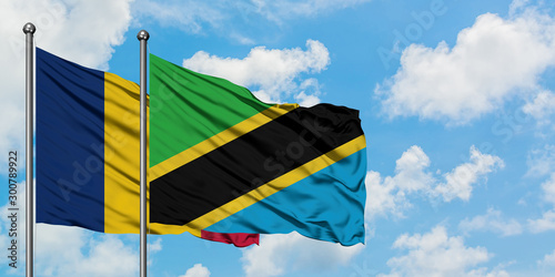 Cuadro en lienzo Chad and Tanzania flag waving in the wind against white cloudy blue sky together