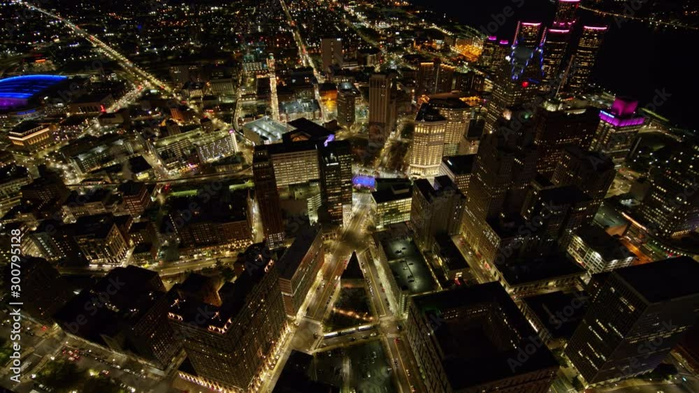 Detroit Michigan Aerial v145 Downtown birdseye cityscape at dusk night moving in descending reverse to skyline view - October 2017