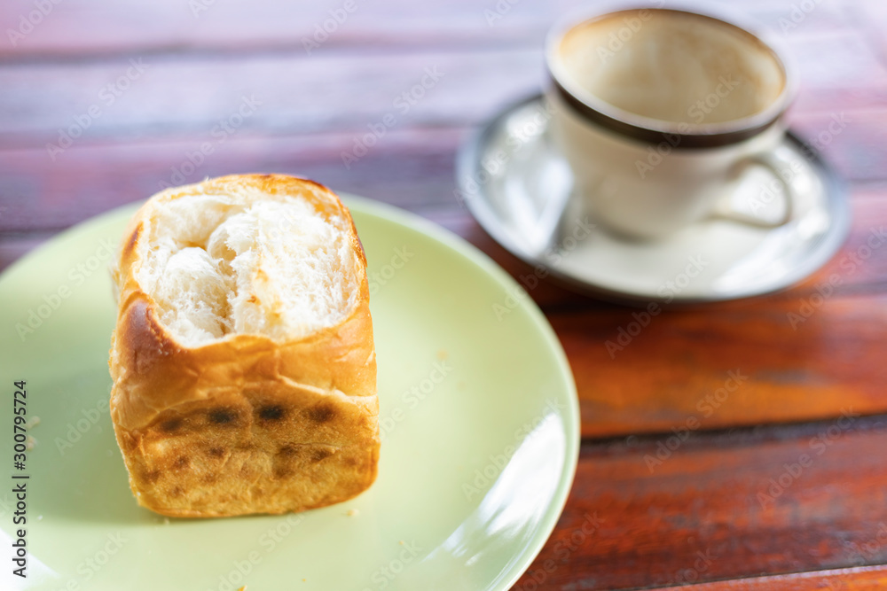 toast bread with coffee cup on wooden table toast bread with coffee cup on wooden table