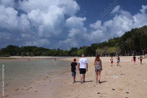 family on the beach in Nusa Dua