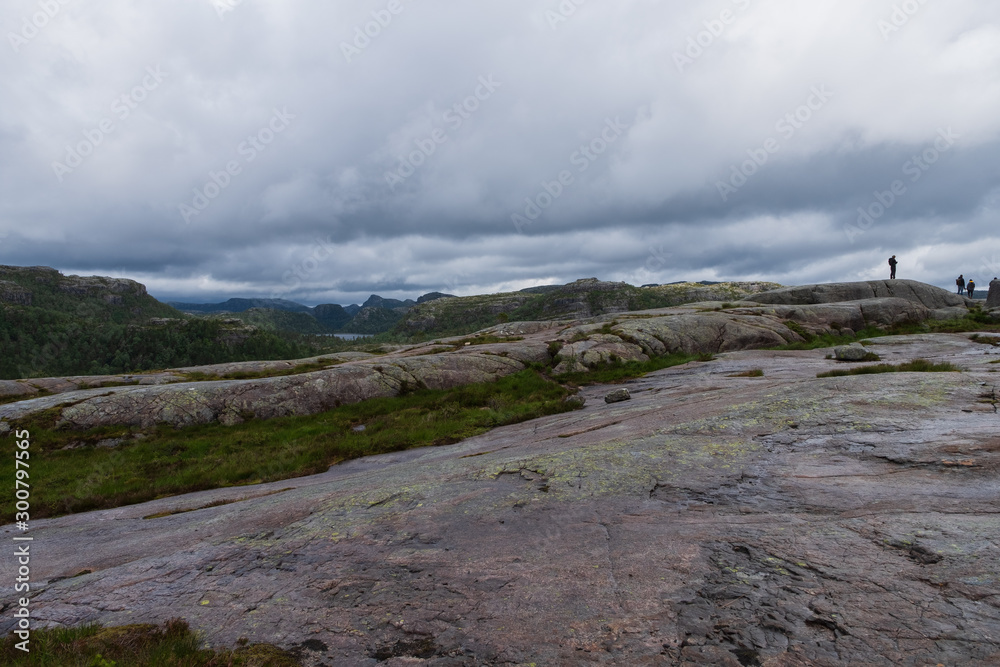 Mountains on the way to the Preachers Pulpit Rock in fjord Lysefjord - Norway - nature and travel background. Lake Tjodnane, july 2019