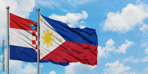 Croatia and Philippines flag waving in the wind against white cloudy blue sky together. Diplomacy concept, international relations.