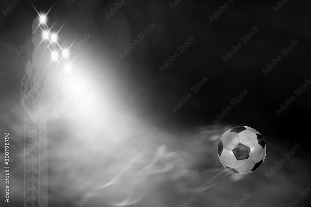 Fototapeta premium Soccer ball movement with spotlights and smoke