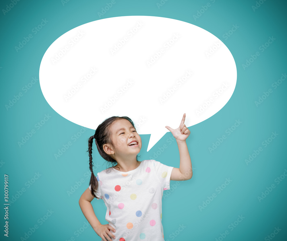 Asian child girl pointing at the blackboard with imagination the empty speech bubble,, Creative and dreams of childhood concept Asian child girl pointing at the blackboard with imagination the empty speech bubble,, Creative and dreams of childhood concept