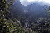 view of mountains and waterfall