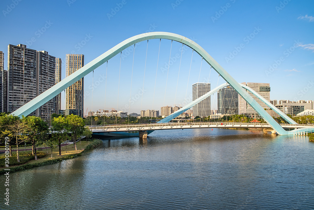 Fototapeta premium Nansha CBD Building and Jiaomen Bridge scenery in Guangzhou, China