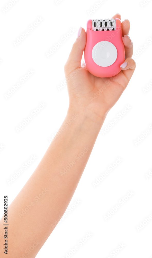 Fototapeta premium Female hand with modern epilator on white background