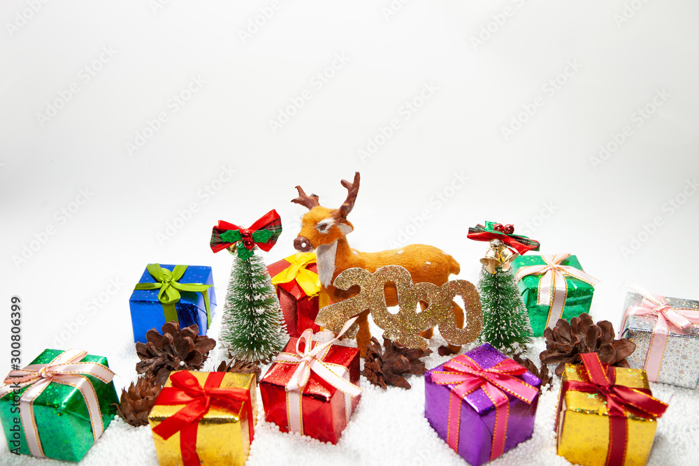 Christmas holiday theme with reindeer and Christmas trees