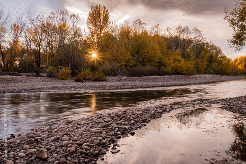 Sunset over Boise river in the fall. photo