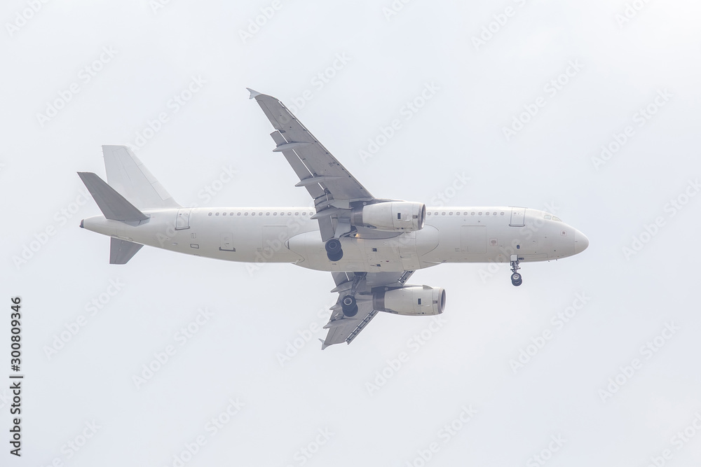 Unspecified white plane isolated on white background. Unspecified white plane isolated on white background.