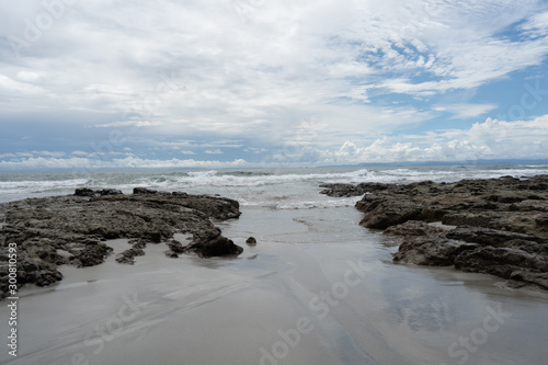 Beautiful close up view of the beach, reef and ocean in Costa Rica