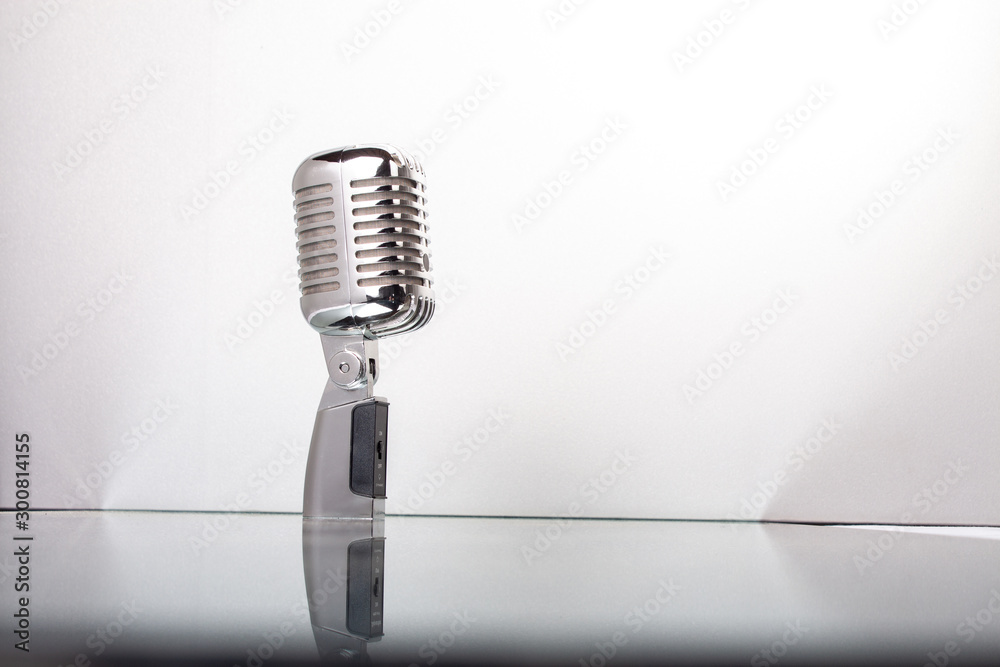Retro microphone isolated on white background. Music and karaoke. Stock  Photo | Adobe Stock