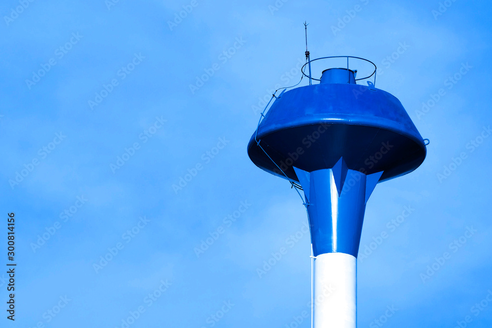 The water tank and blue sky background