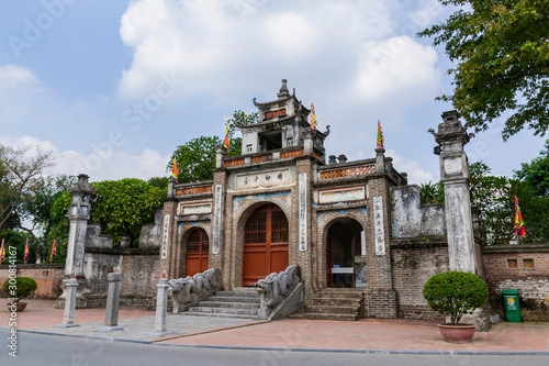 The main gate of Thuong shrine in ancient Co Loa citadel, Vietnam. Co Loa was capital of Au Lac (old Vietnam), the country was founded by Thuc Phan about 2nd century BC. photo