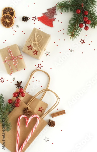 Christmas background with fir twigs, gift box,  shopping bags, Xmas or new ye...