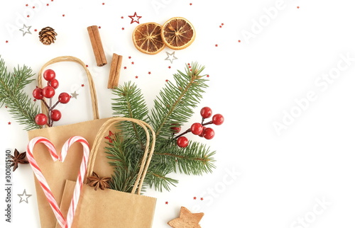 Christmas background with fir twigs, gift box,  shopping bags, Xmas or new ye...