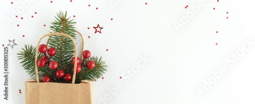 Christmas background banner with fir twigs, gift box,  shopping bags, Xmas or...