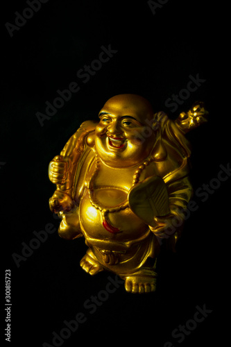 Gold color happy Buddha statue
