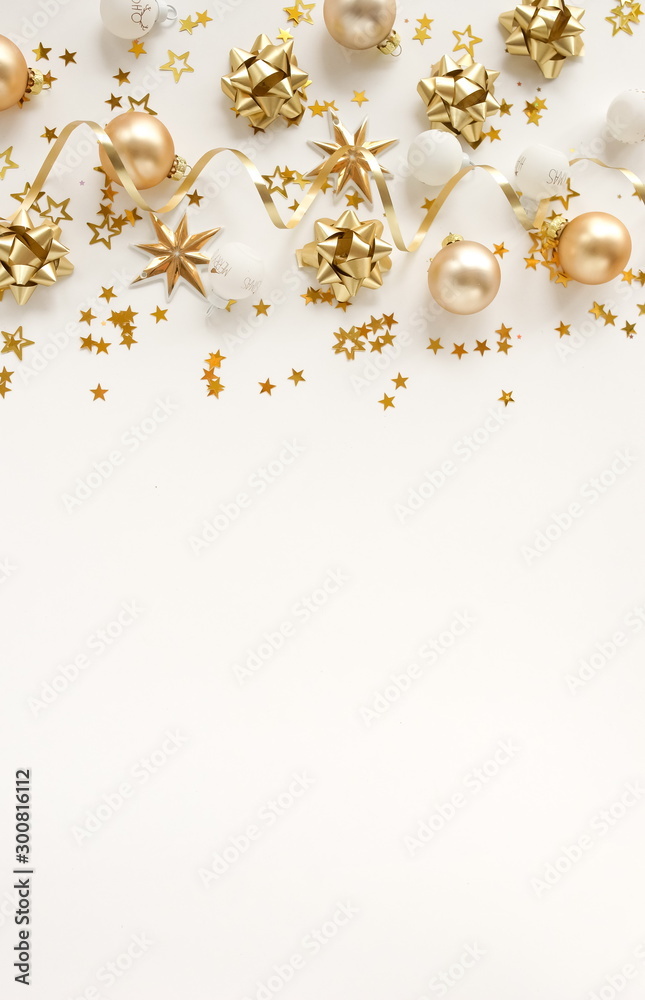Christmas background. Xmas or new year gold white decorations on white background top view. holiday and celebration concept for postcard or 