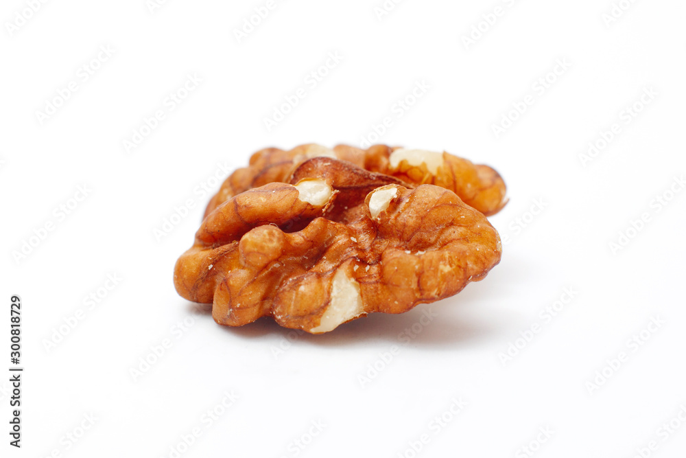 Obraz premium Processed walnut isolated on white background with clipping path