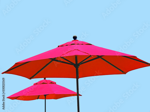 Red market umbrella isolated on blue sky
