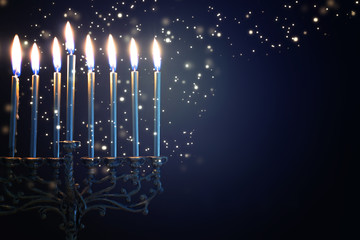 Religion image of jewish holiday Hanukkah background with menorah (traditional candelabra) and candles